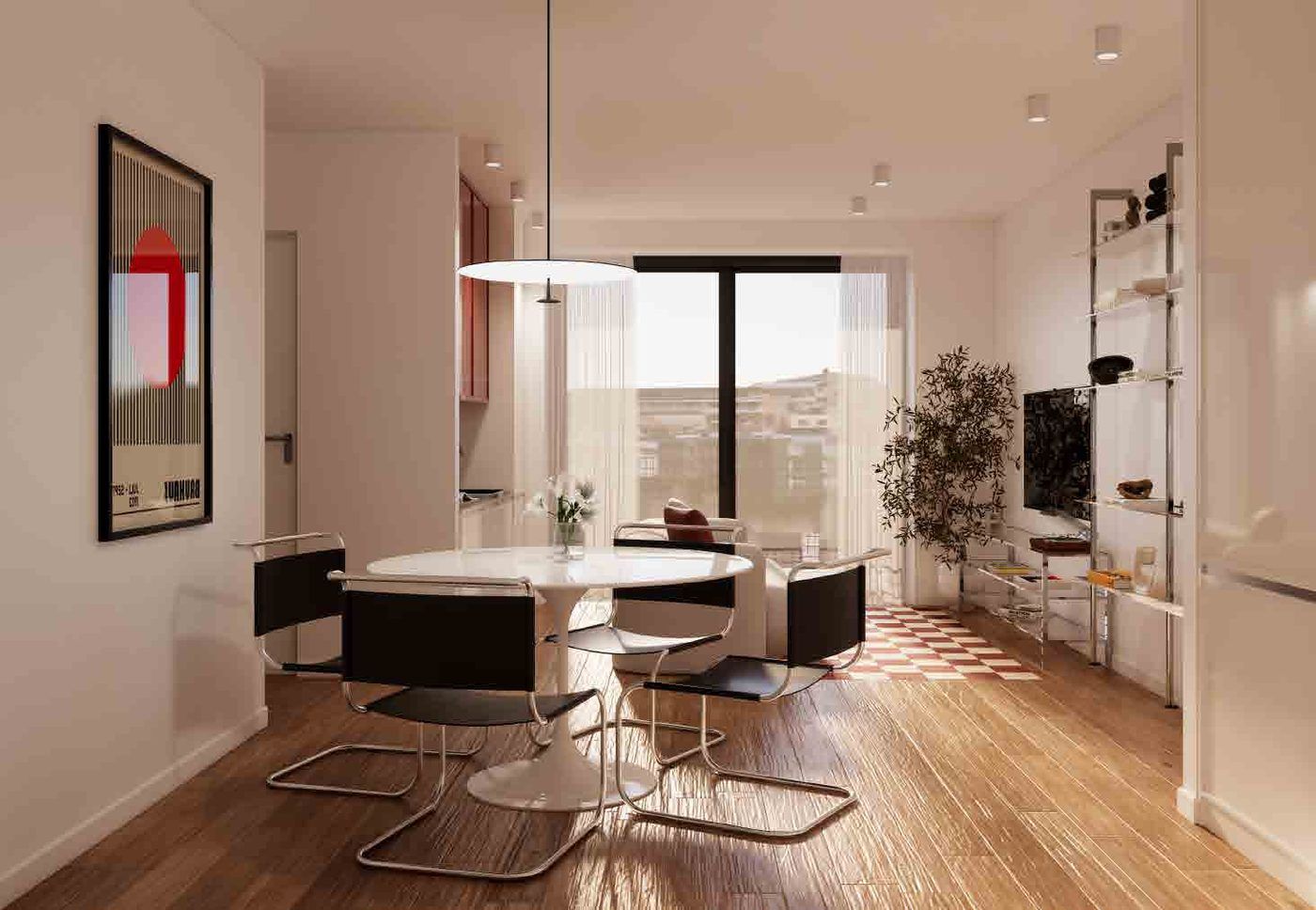Zona giorno con cucina e tavolo da pranzo